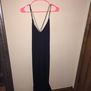 Tobi black dress with slit on leg size medium